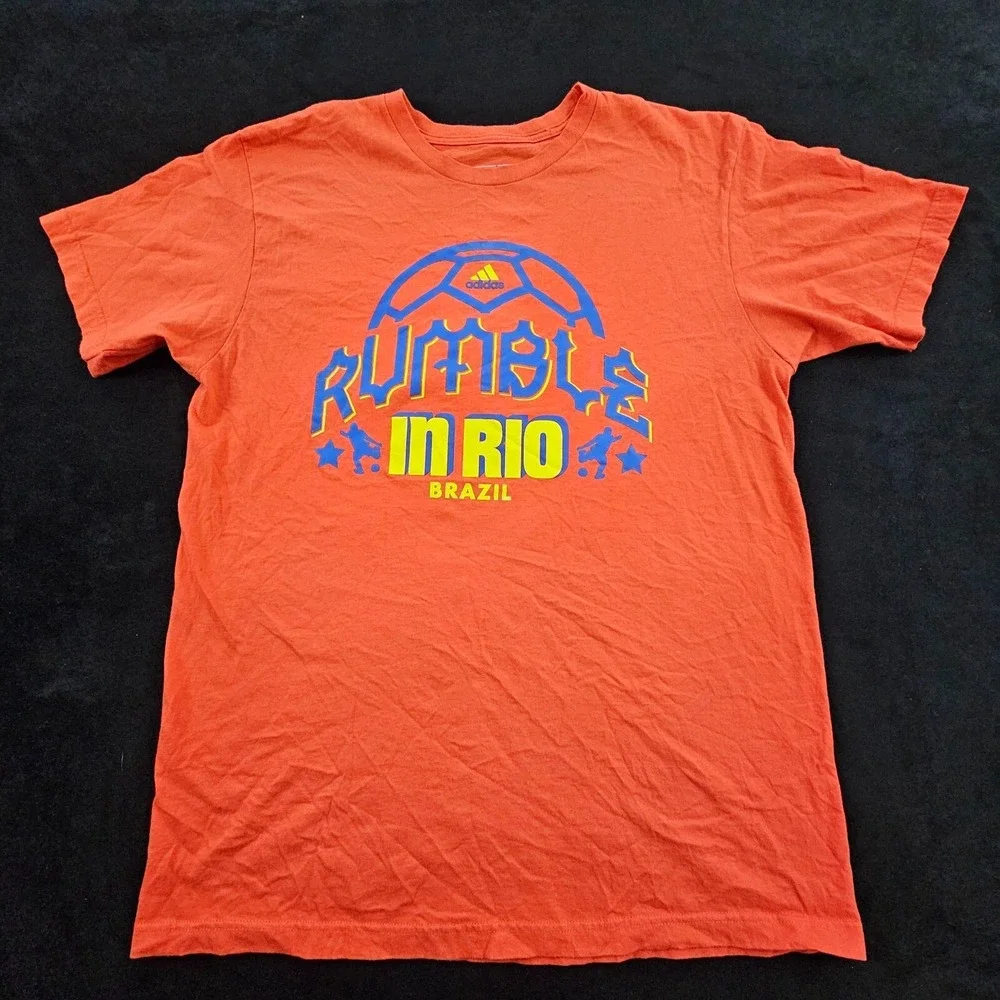 Rumble in Rio Brazil Soccer Red Short Sleeve Cotton T-Shirt Men's L